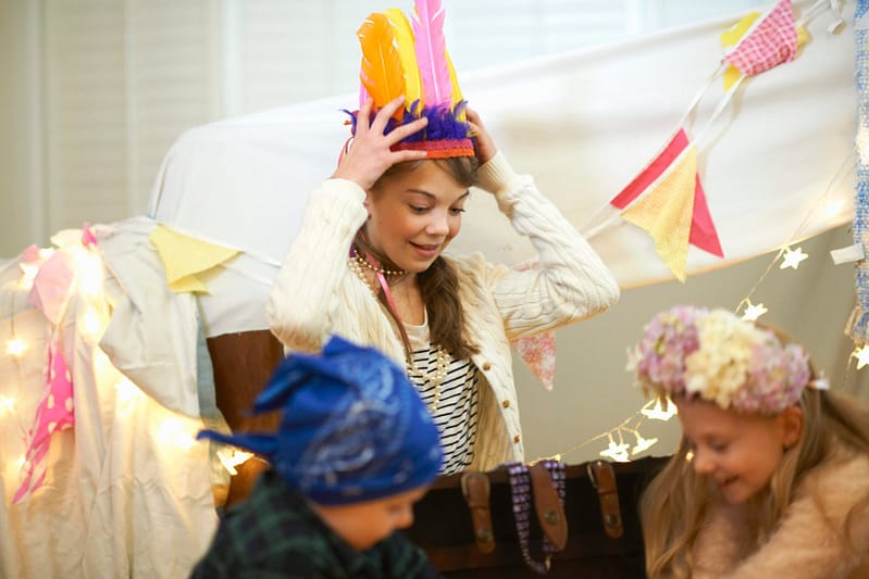 boy-and-two-sisters-playing-dress-up-from-treasure-chest
