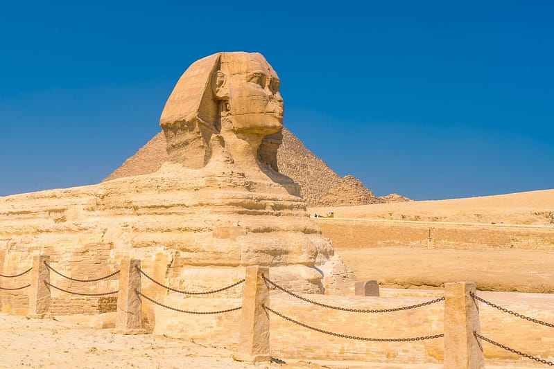 the-great-sphinx-of-giza-and-in-the-background-the-pyramids-of-giza
